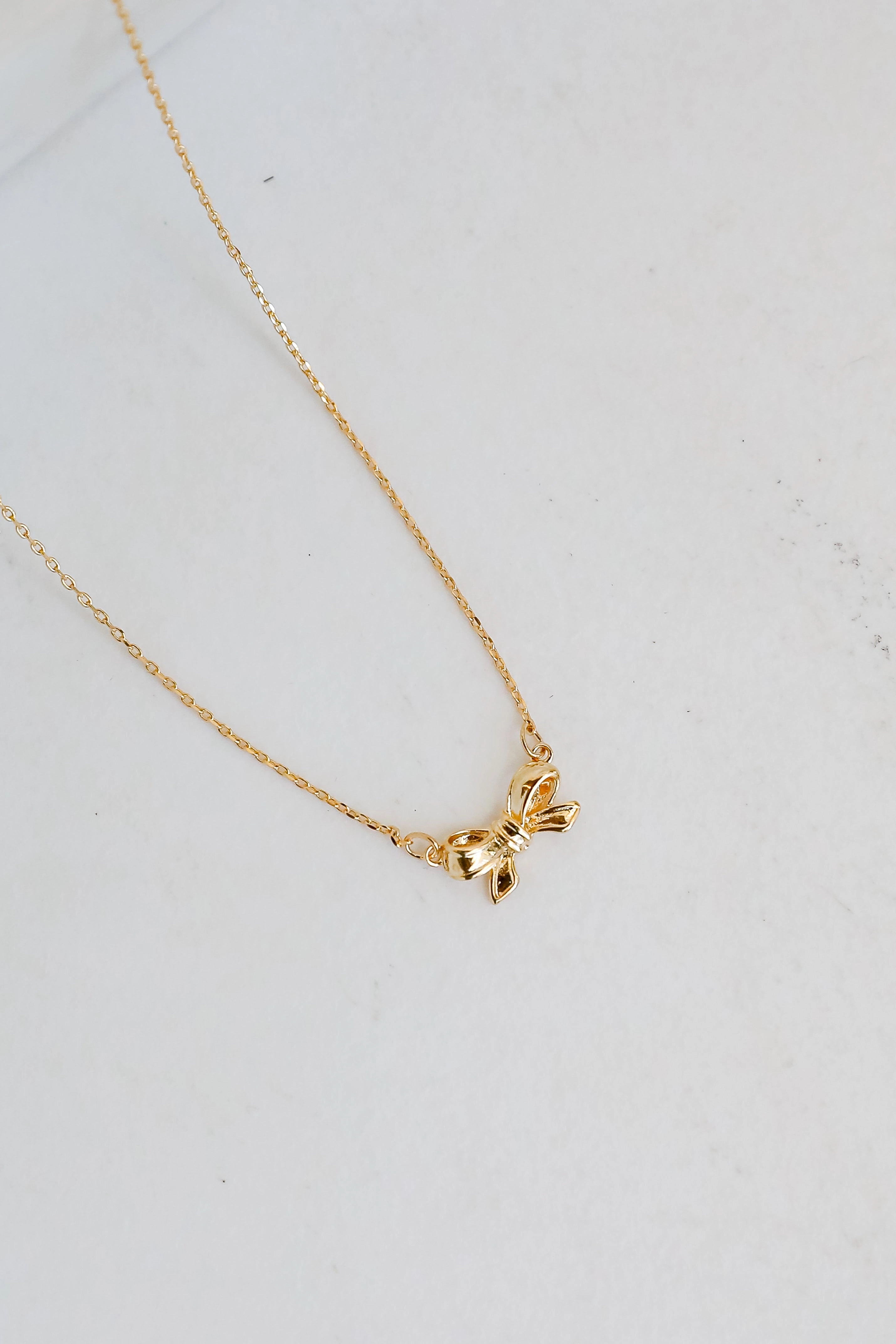 Brooke Gold Bow Charm Necklace