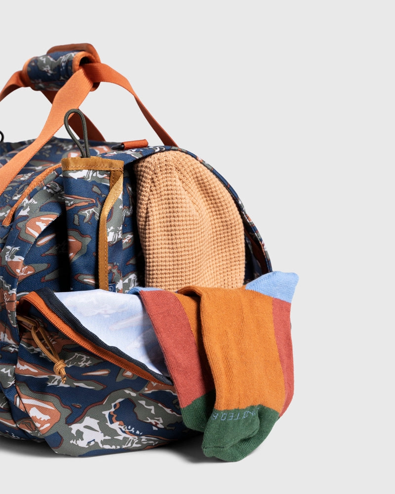 (R)evolution™ 27L Mini Duffle - Cardinal. Lakeside Camo