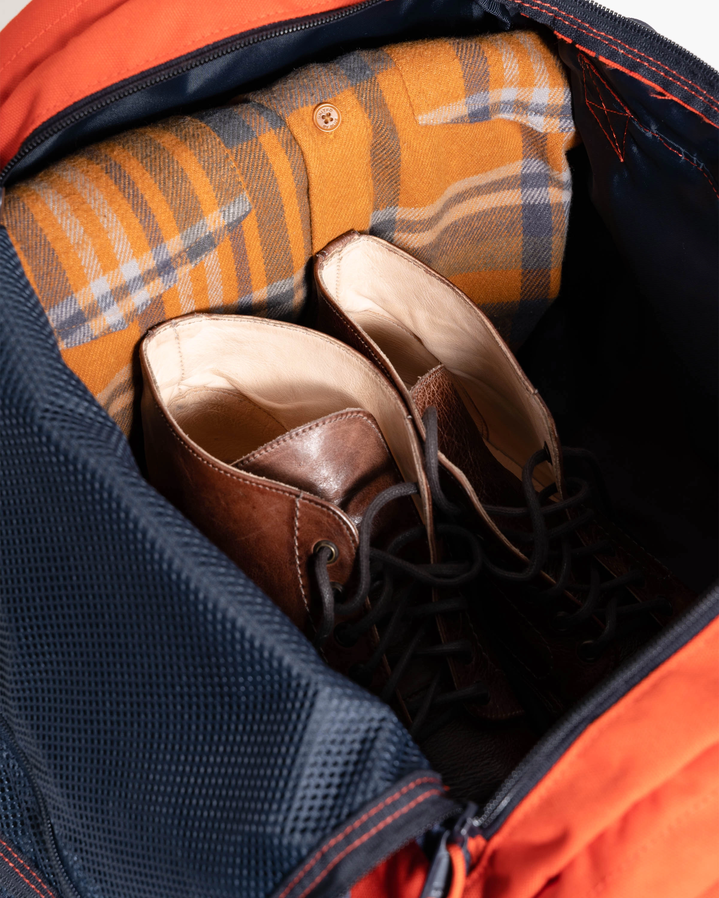 (R)evolution™ 27L Mini Duffle - Cardinal. Lakeside Camo
